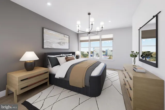 a bedroom with bed and window