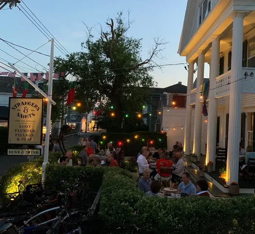 a view of a street with sitting area