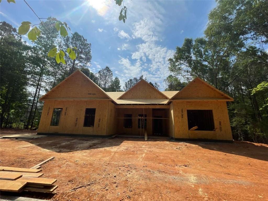 453 Michael Etchison Road Monroe, GA 30655 - Photo 1 of 1 a front view of a house with a yard and garage