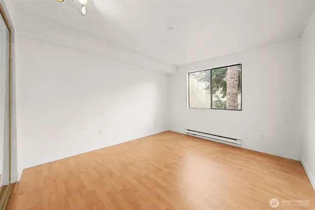 a view of an empty room and window