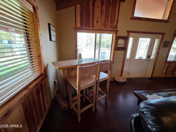 a bathroom with sink a mirror a toilet and a sink