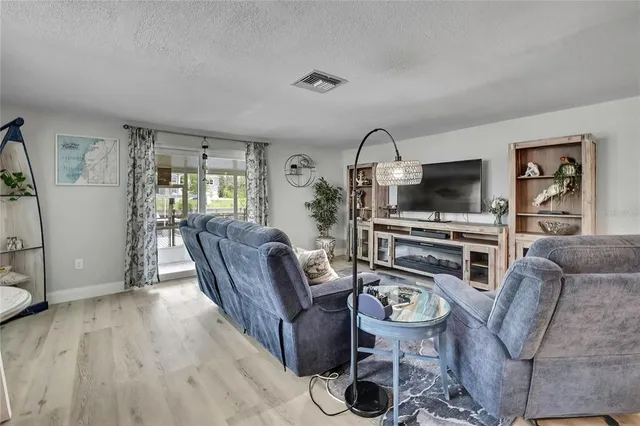 a living room with furniture and a couch
