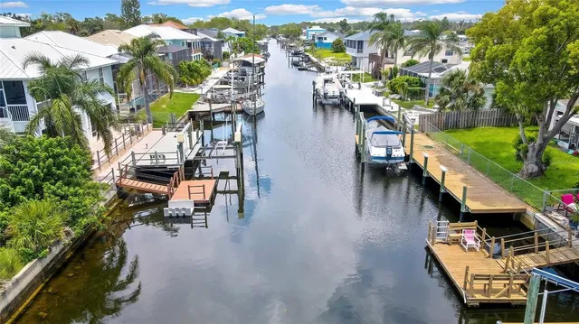 an aerial view of a houses with outdoor space