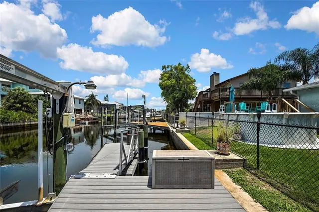 a view of a lake and a patio
