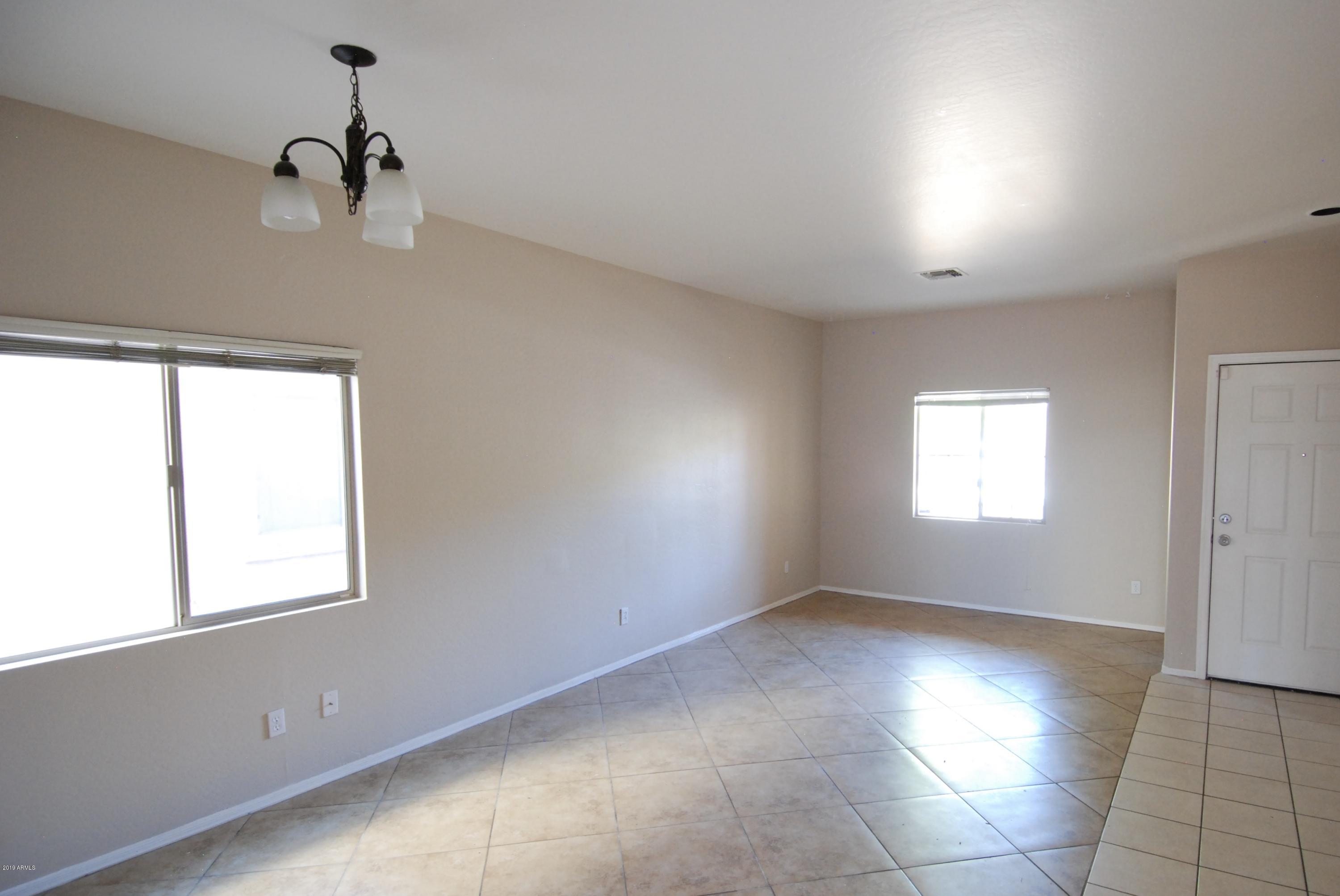 5219 West Maldonado Road Laveen, AZ 85339 - Photo 3 of 19 Living room