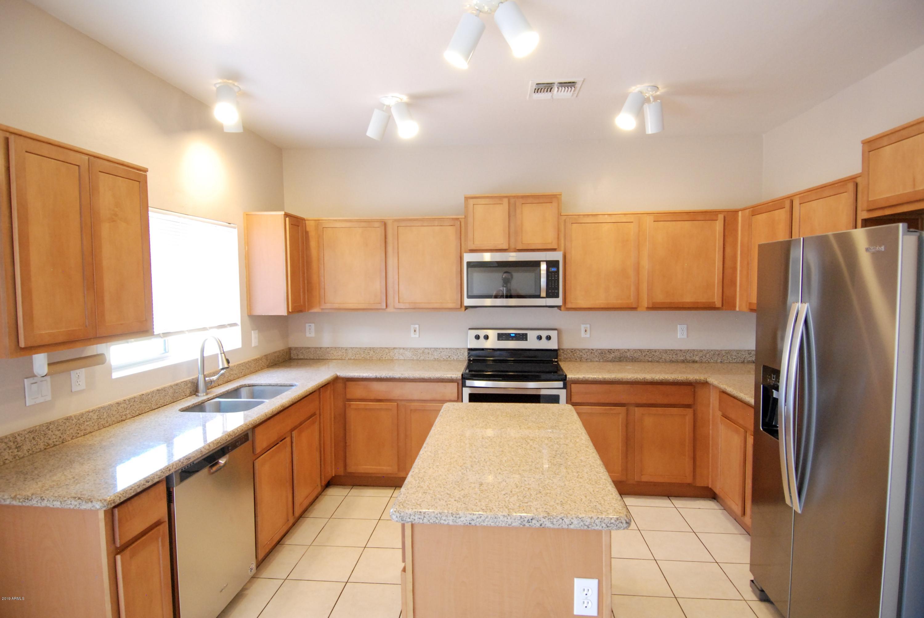 5219 West Maldonado Road Laveen, AZ 85339 - Photo 4 of 19 Kitchen and island