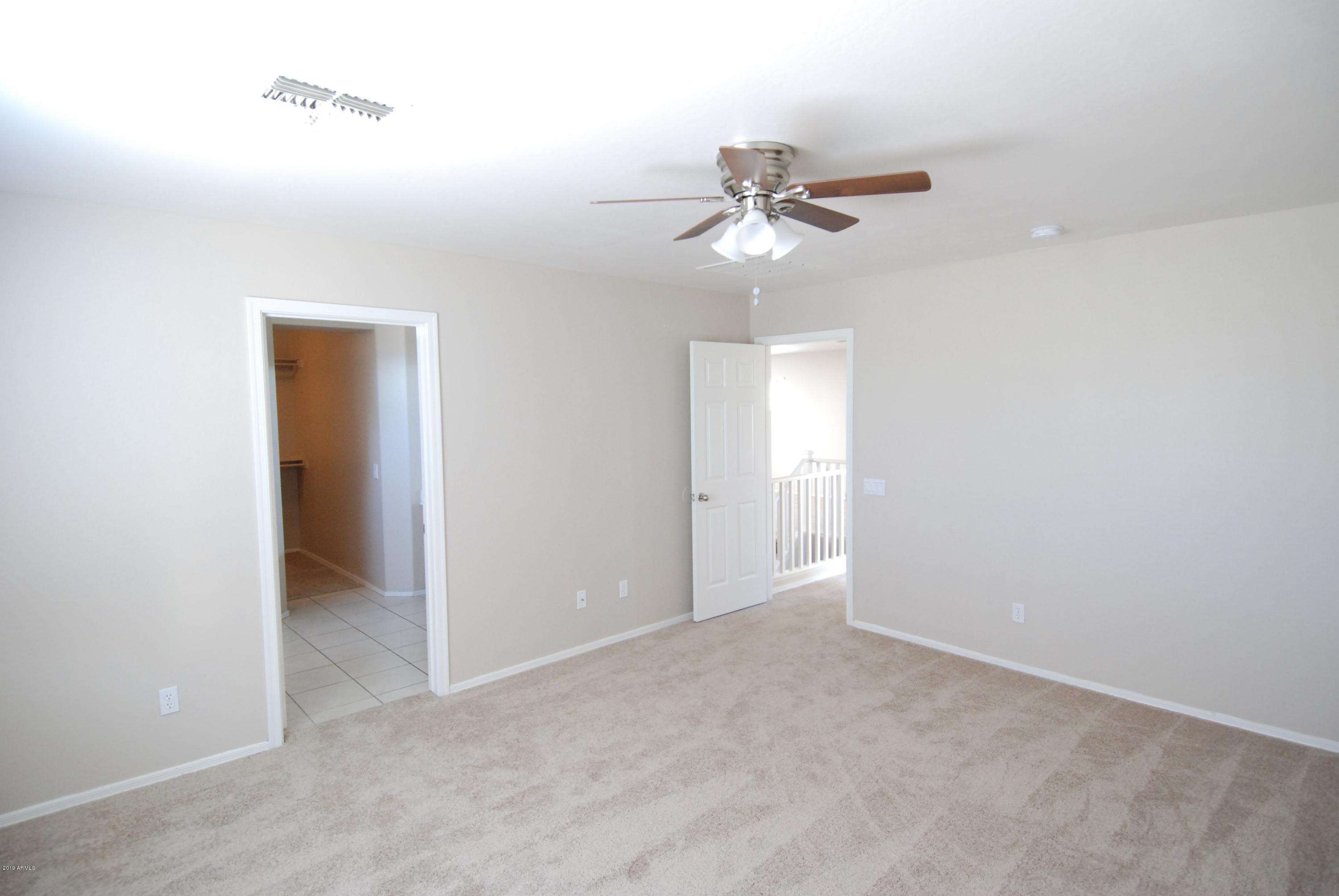 5219 West Maldonado Road Laveen, AZ 85339 - Photo 9 of 19 Master bedroom & new carpet