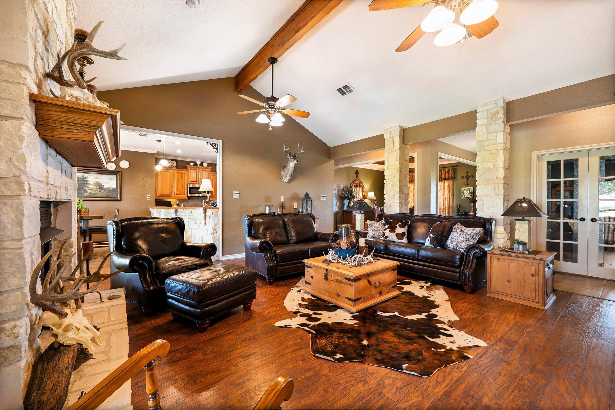 19000 Farm To Market Road 971 Granger, TX 76530 - Photo 9 of 40 The living room is a key highlight with towering ceilings.