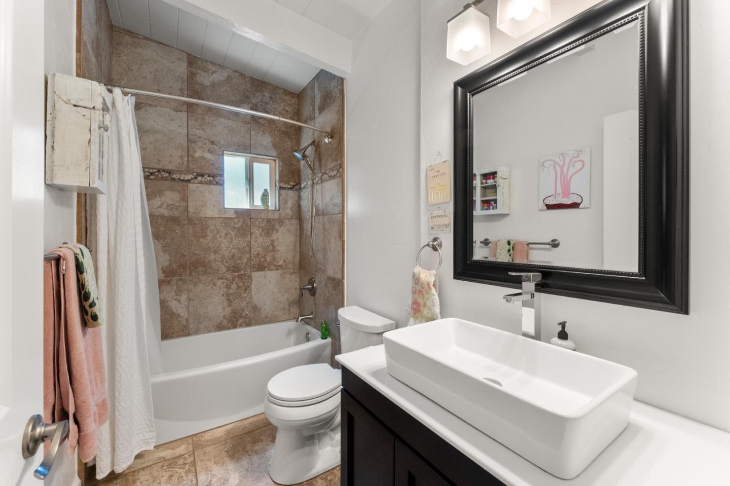 140 Baker Road Aptos, CA 95003 - Photo 12 of 62 a bathroom with a sink toilet and shower