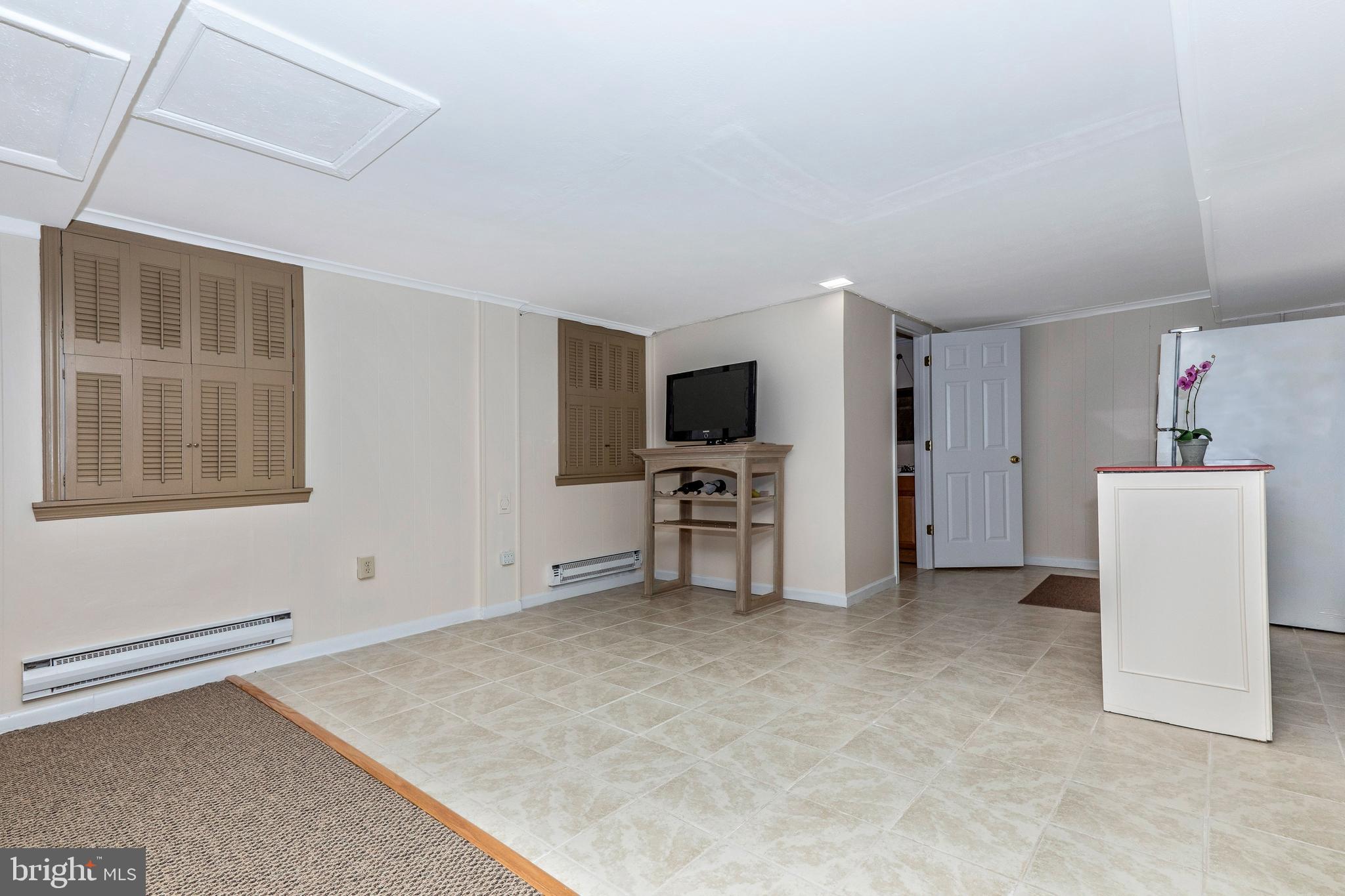 12150 Fingerboard Road Monrovia, MD 21770 - Photo 38 of 56 Lower Level next to bar leading to bathroom