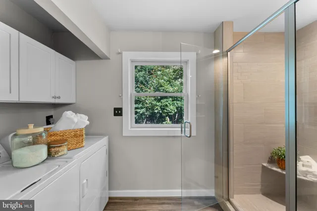 a spacious bedroom with a bed and a couch