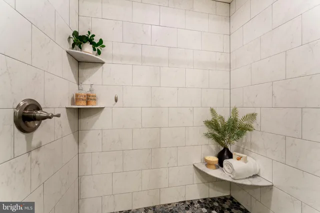 a view of a house with backyard sitting area and garden