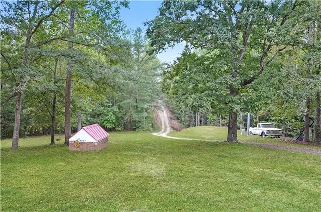 a garden view with a sitting space