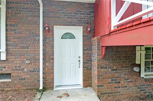 a front view of a building with door