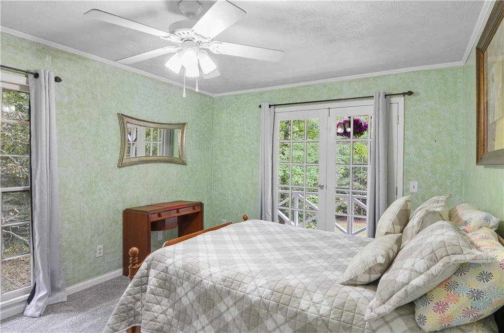 3243 Highway 184 Toccoa, GA 30577 - Photo 25 of 33 a bedroom with a bed dresser and a window