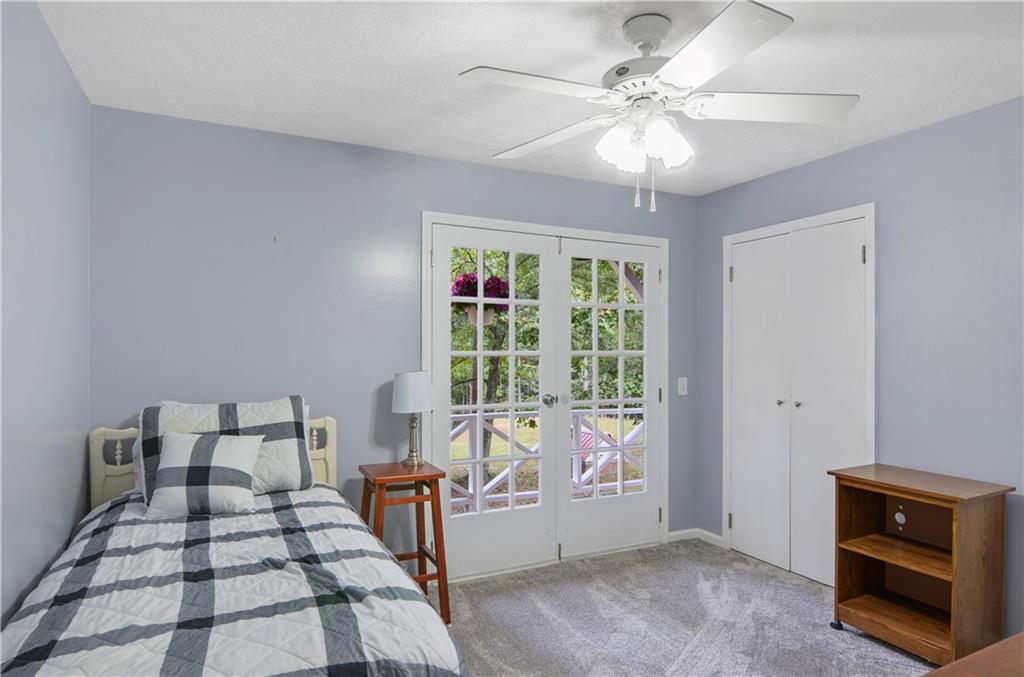 3243 Highway 184 Toccoa, GA 30577 - Photo 28 of 33 a bedroom with furniture and windows