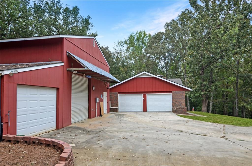 3243 Highway 184 Toccoa, GA 30577 - Photo 6 of 33 a front view of a house with a yard