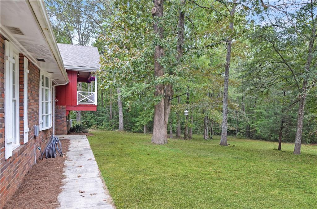 3243 Highway 184 Toccoa, GA 30577 - Photo 10 of 33 a pathway of a house with a yard