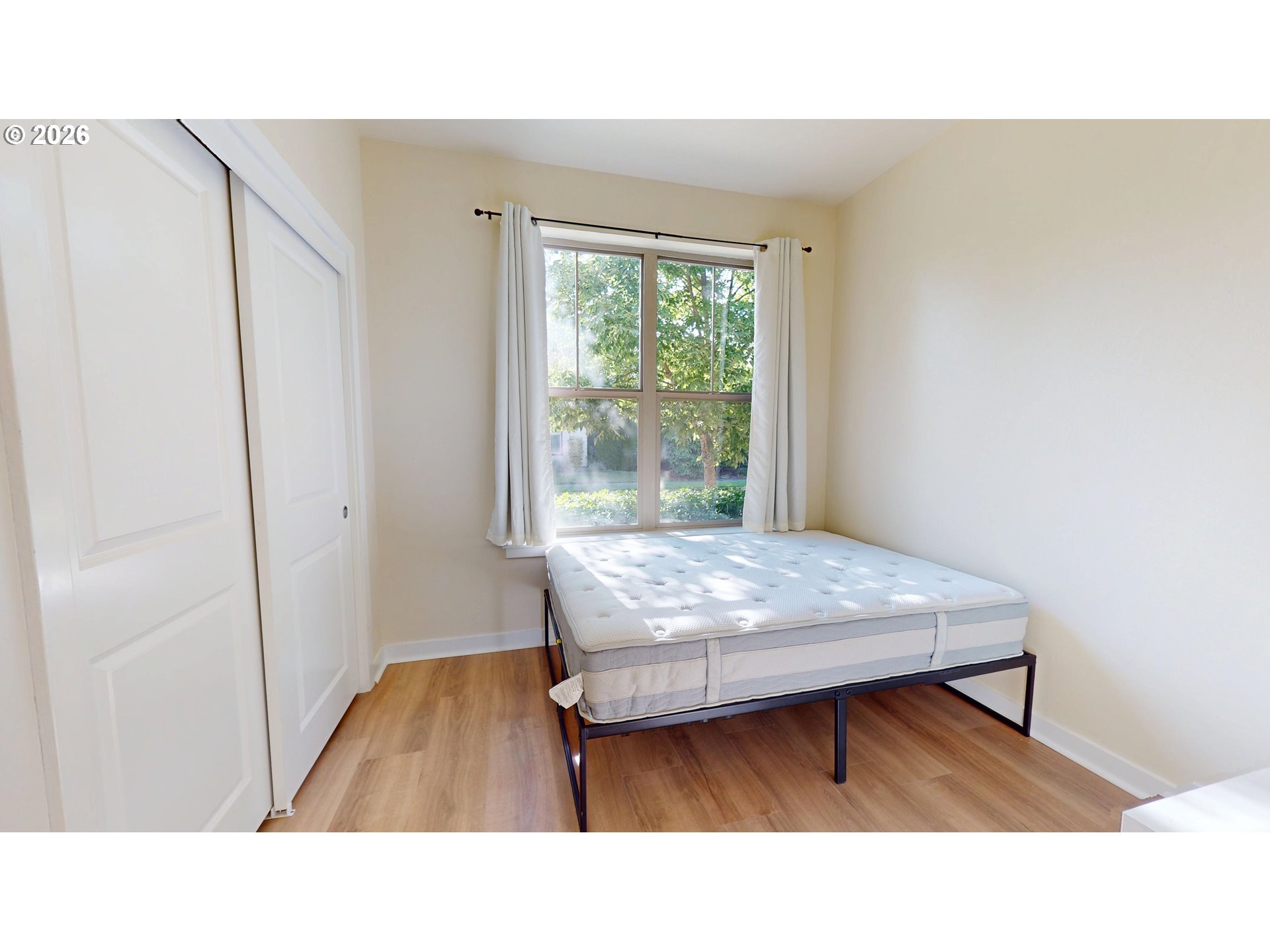 375 Mia Lane Eugene, OR 97401 - Photo 24 of 44 a living room with a bed furniture and a window