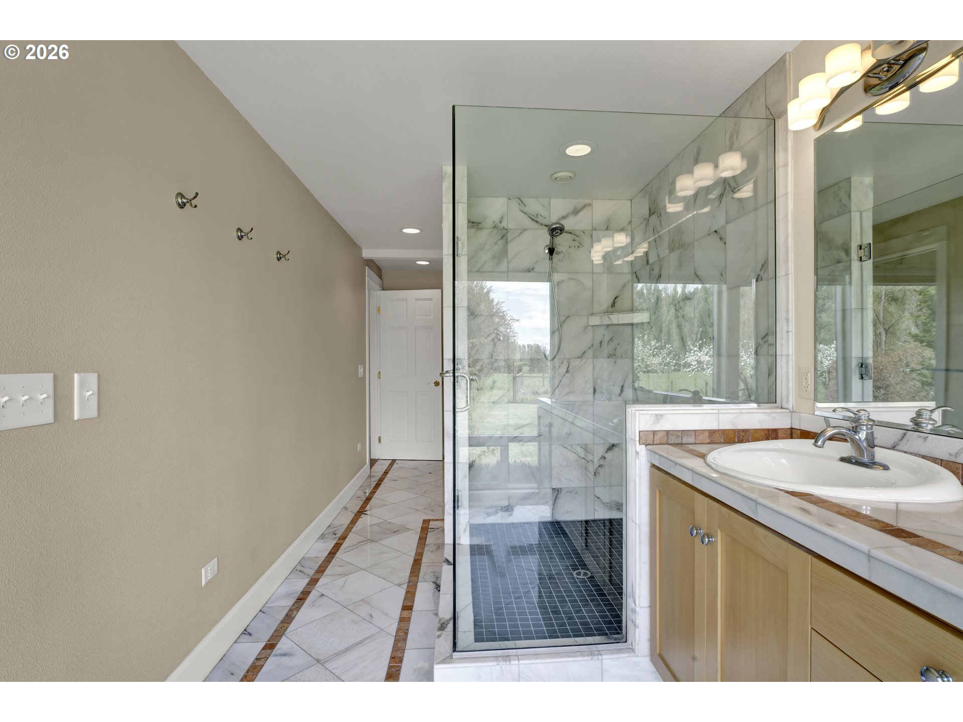 7924 Thurston Road Springfield, OR 97478 - Photo 23 of 45 a bathroom with a sink and a mirror
