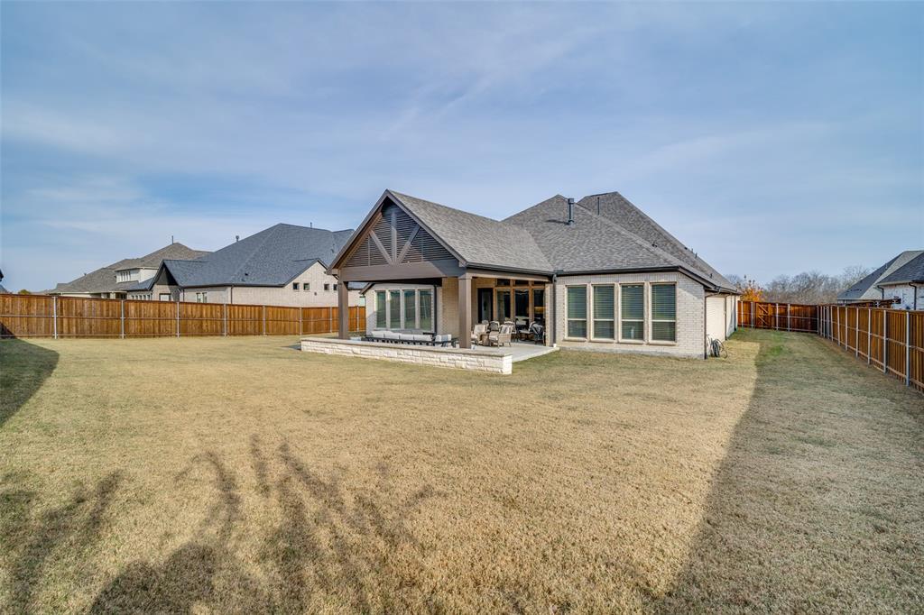 1614 Ripasso Way McLendon-Chisholm, TX 75032 - Photo 35 of 36 Side yards are wide giving you space from the neighbors. Plenty of room if you wanted a dog run.