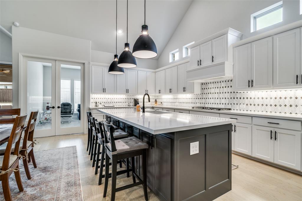 1614 Ripasso Way McLendon-Chisholm, TX 75032 - Photo 9 of 36 Plenty of room to visit and eat at the counter.