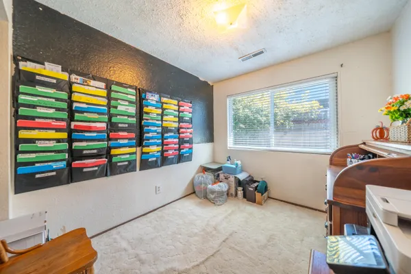 a room with toys and a flat screen tv