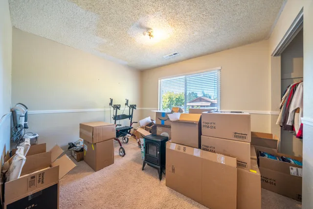 a room with furniture and a window