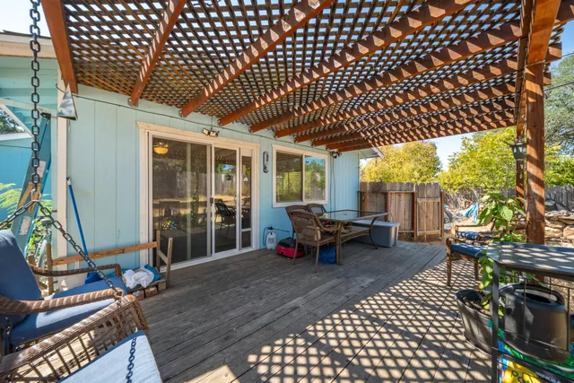 a view of a porch with furniture
