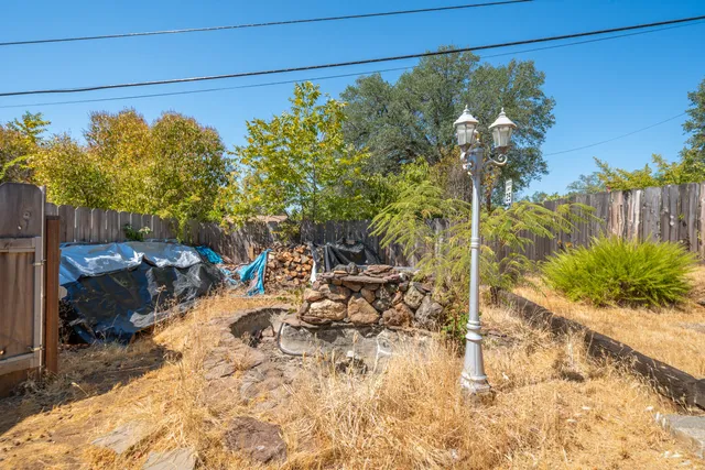 a view of a backyard of a house