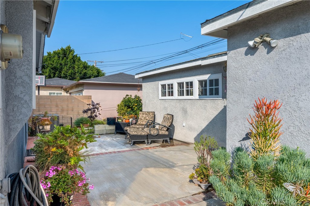 5016 Falcon Avenue Long Beach, CA 90807 - Photo 18 of 23 a backyard of a house with outdoor seating