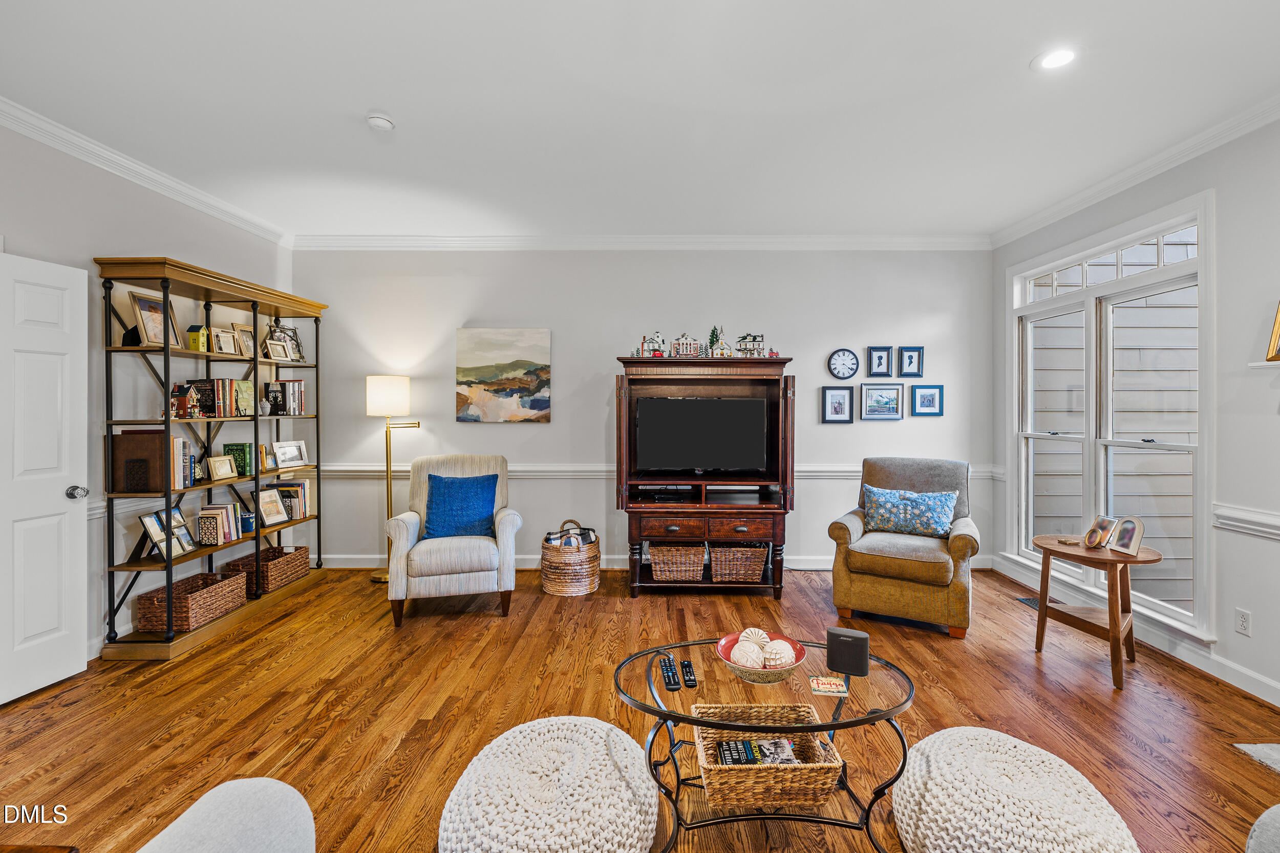 6011 Tenter Banks Square Raleigh, NC 27609 - Photo 16 of 37 a living room with furniture and a flat screen tv