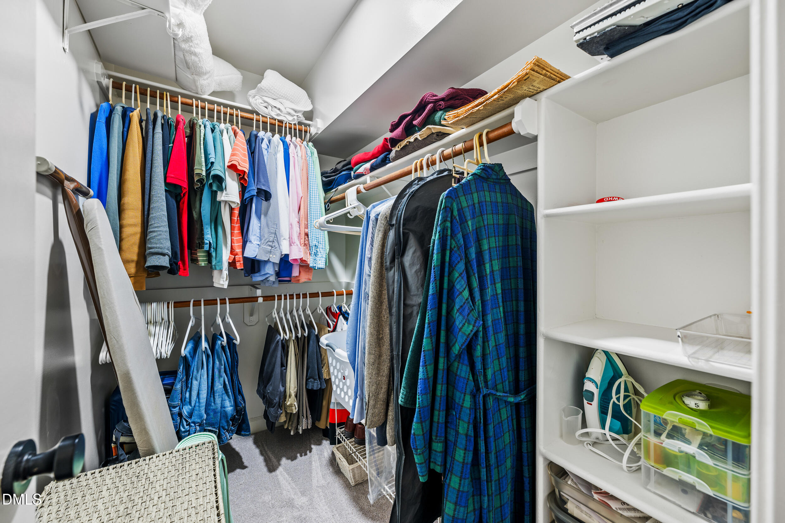 6011 Tenter Banks Square Raleigh, NC 27609 - Photo 28 of 37 a view of walk in closet with clothes