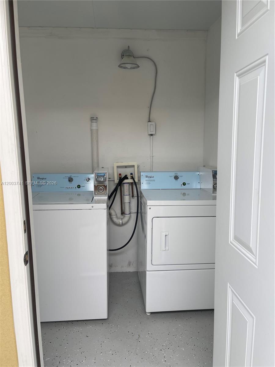 317 East 8th Street, Unit 3 Hialeah, FL 33010 - Photo 19 of 19 a utility room with dryer and washer