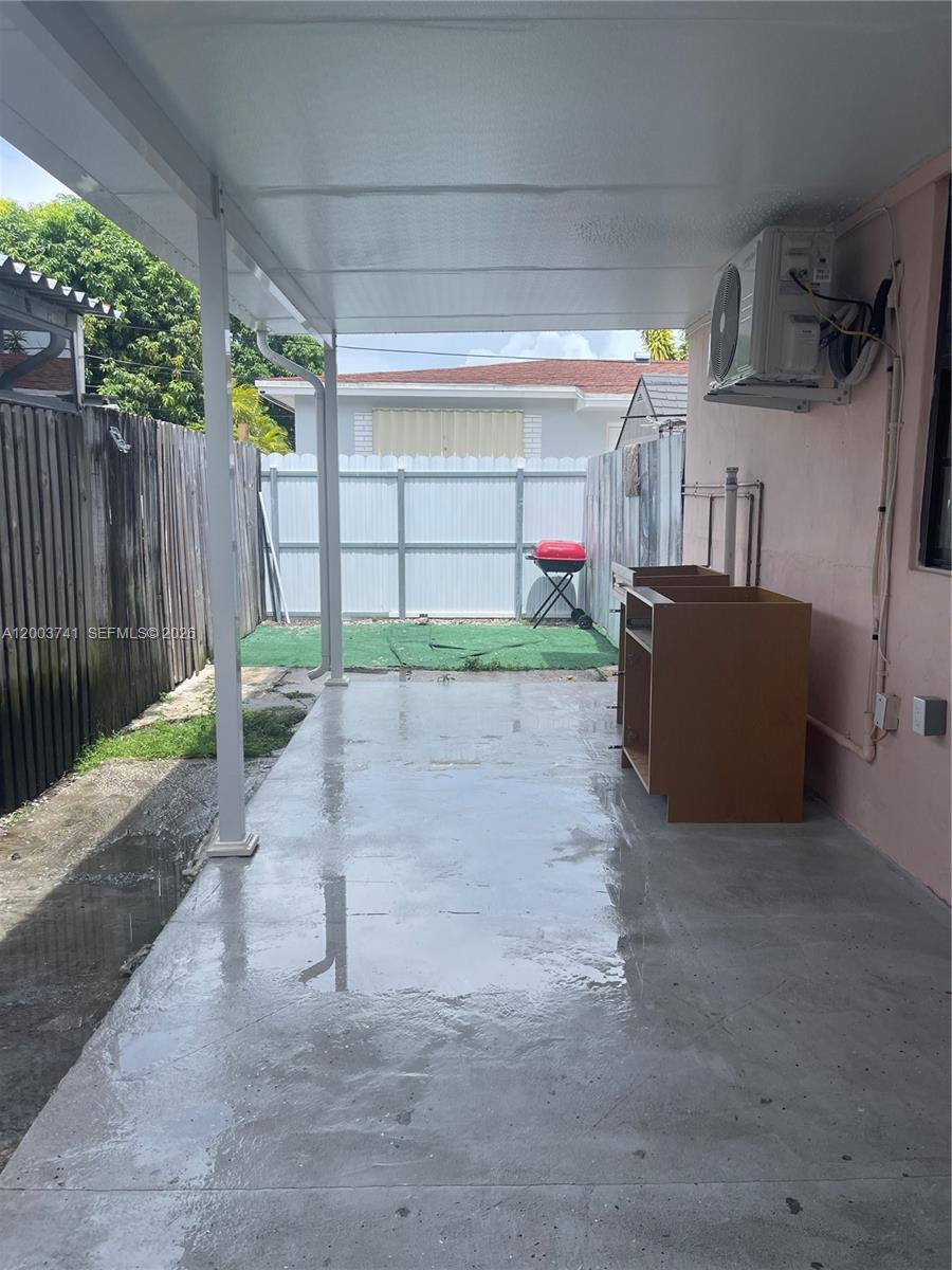 317 East 8th Street, Unit 3 Hialeah, FL 33010 - Photo 4 of 19 a view of backyard and tree
