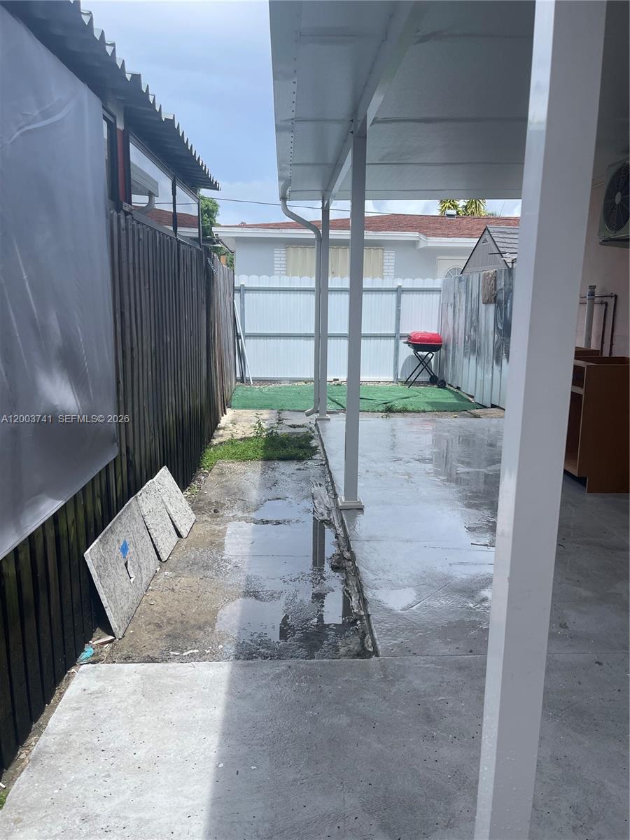 317 East 8th Street, Unit 3 Hialeah, FL 33010 - Photo 5 of 19 a view of a garage