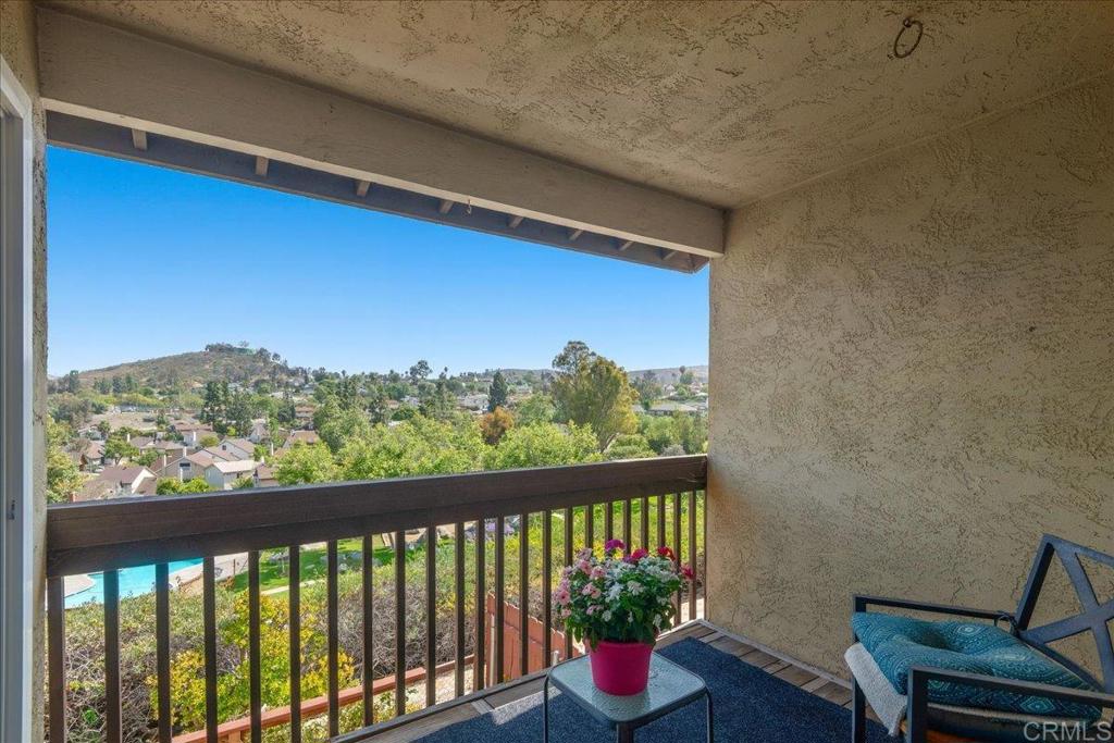3047 Highlands Boulevard Spring Valley, CA 91977 - Photo 26 of 39 a view of a balcony with chair and wooden floor