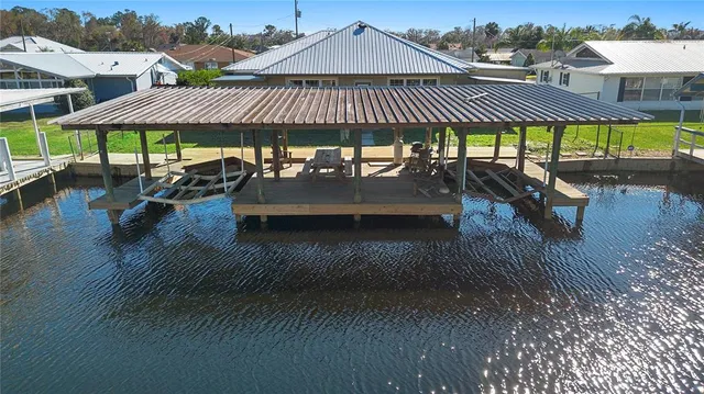 an outdoor space with patio and umbrella