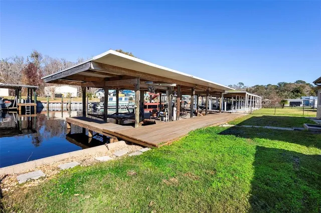 a view of a park with lawn chairs
