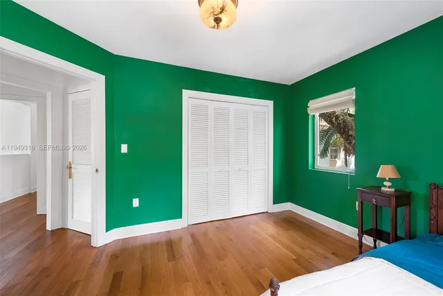 a bathroom with a sink toilet and a mirror