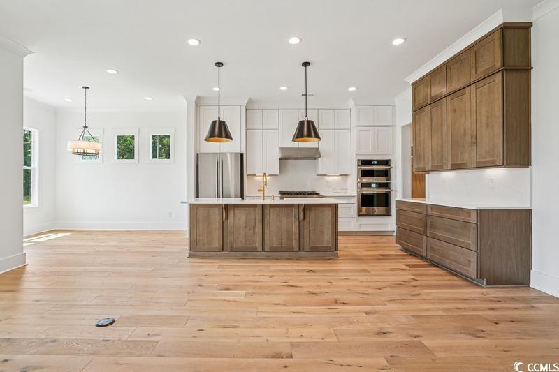6709 Genesis Drive Murrells Inlet, SC 29576 - Photo 4 of 14 Kitchen with appliances with stainless steel finis
