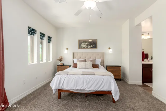 a bathroom with a sink vanity and a toilet