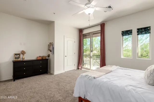 a view of a wooden fence and a bench