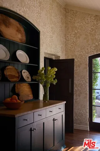 a kitchen with a sink and a stove