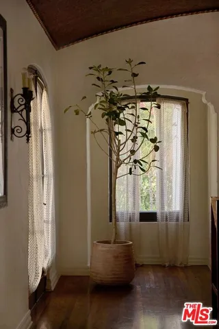 a kitchen with stainless steel appliances granite countertop a stove and a refrigerator