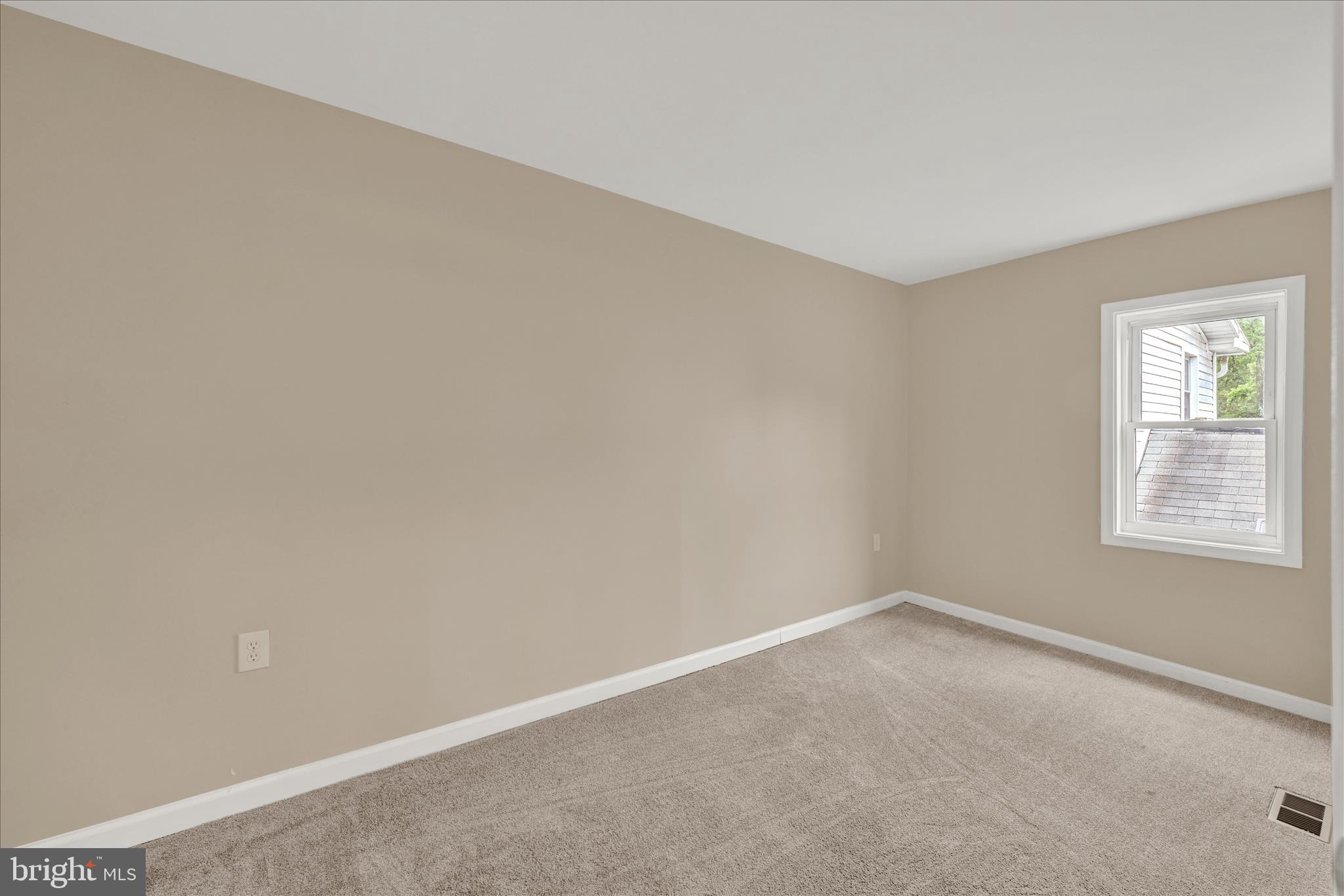 8511 Frederick Road Ellicott City, MD 21043 - Photo 24 of 36 an empty room with a window