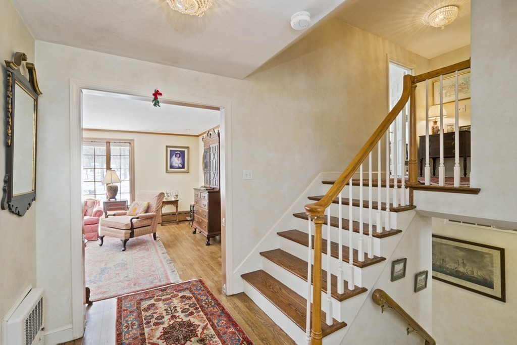 62 Rust Way Cohasset, MA 02025 - Photo 11 of 17 a view of entryway and hall with wooden floor