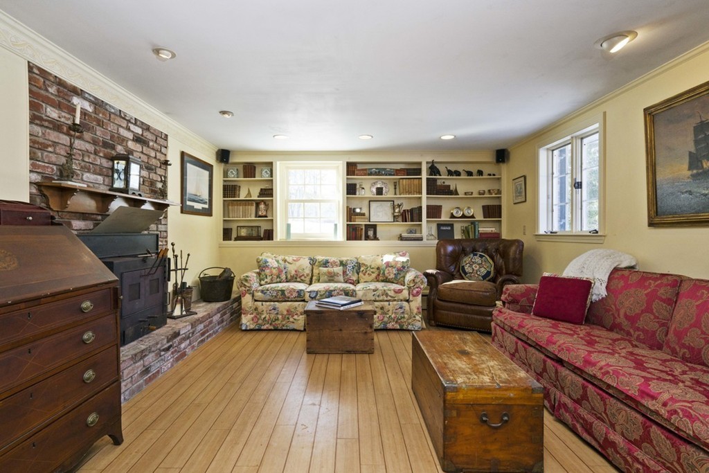62 Rust Way Cohasset, MA 02025 - Photo 12 of 17 a living room with furniture and a flat screen tv