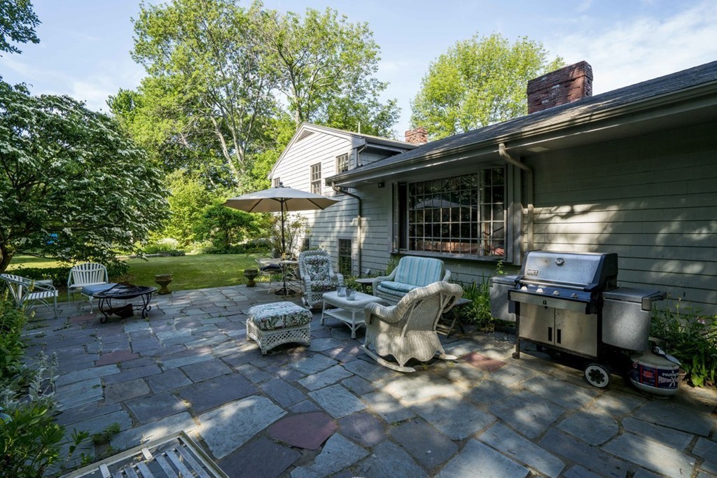 62 Rust Way Cohasset, MA 02025 - Photo 13 of 17 a view of backyard with outdoor seating and plants