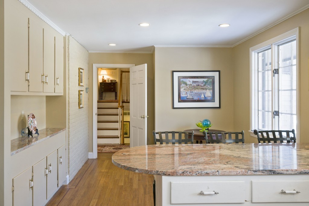 62 Rust Way Cohasset, MA 02025 - Photo 4 of 17 a view of a kitchen cabinets and chandelier
